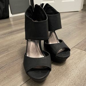 Black wedge heels size 7.5